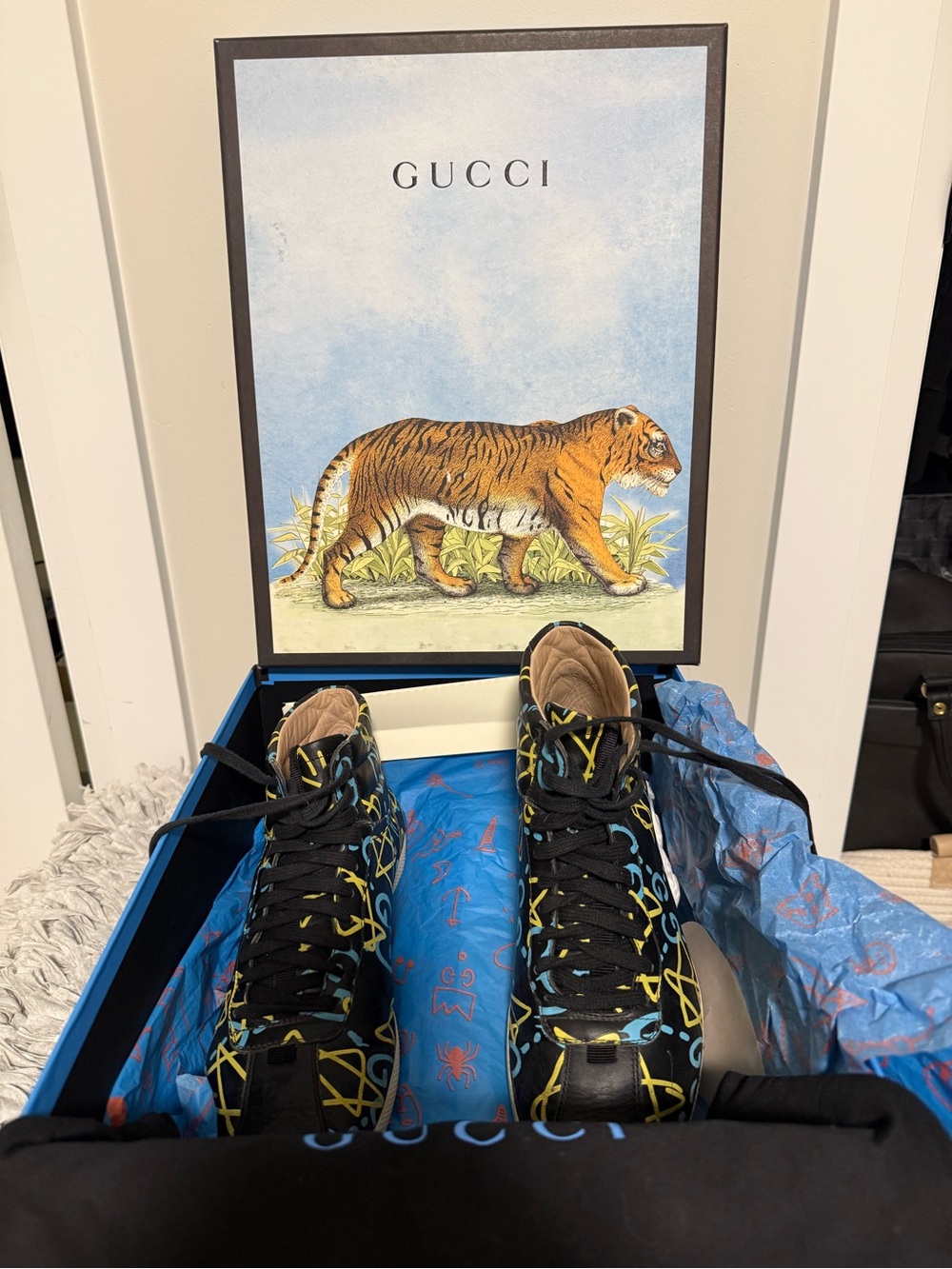 Authentic Gucci unisex Black High-Top Sneakers with Yellow & Blue Graphic